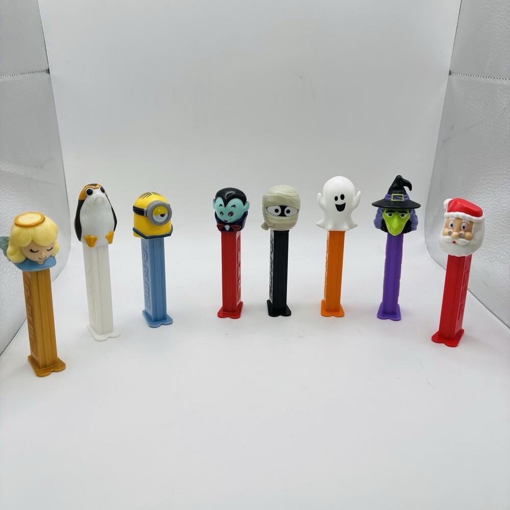 Pez Dispenser Candy Vintage Lot - 8 Holiday And Movie Characters Nice Condition.